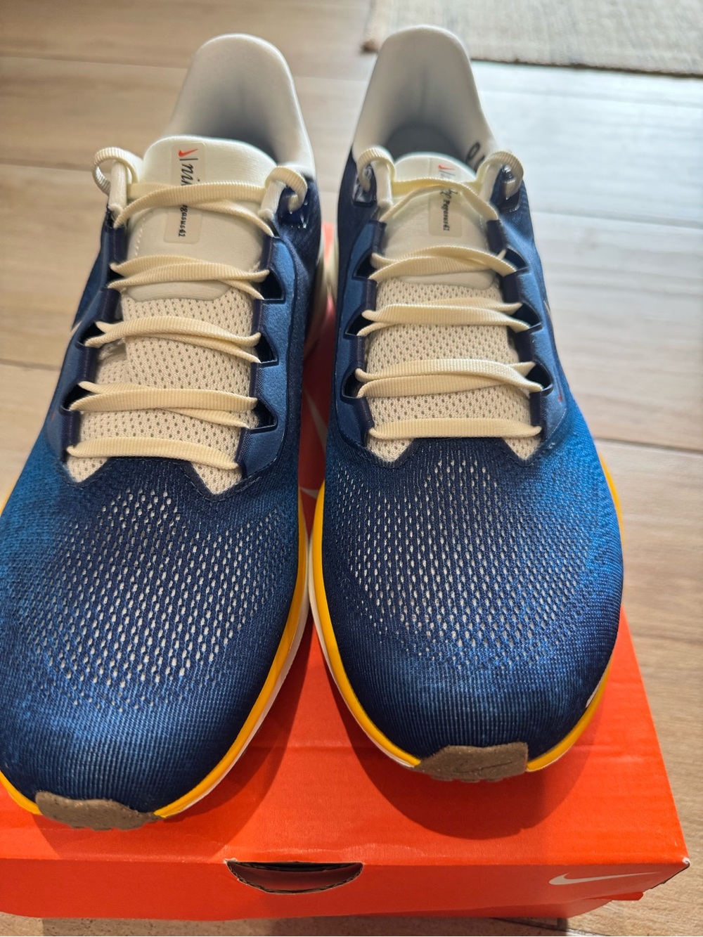 Nike Men’s Navy Blue Athletic Running Shoes with Yellow Accents